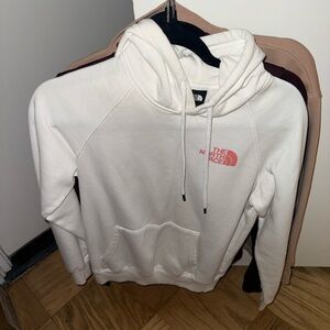 The North Face White Hoodie with Pink Logo Accent